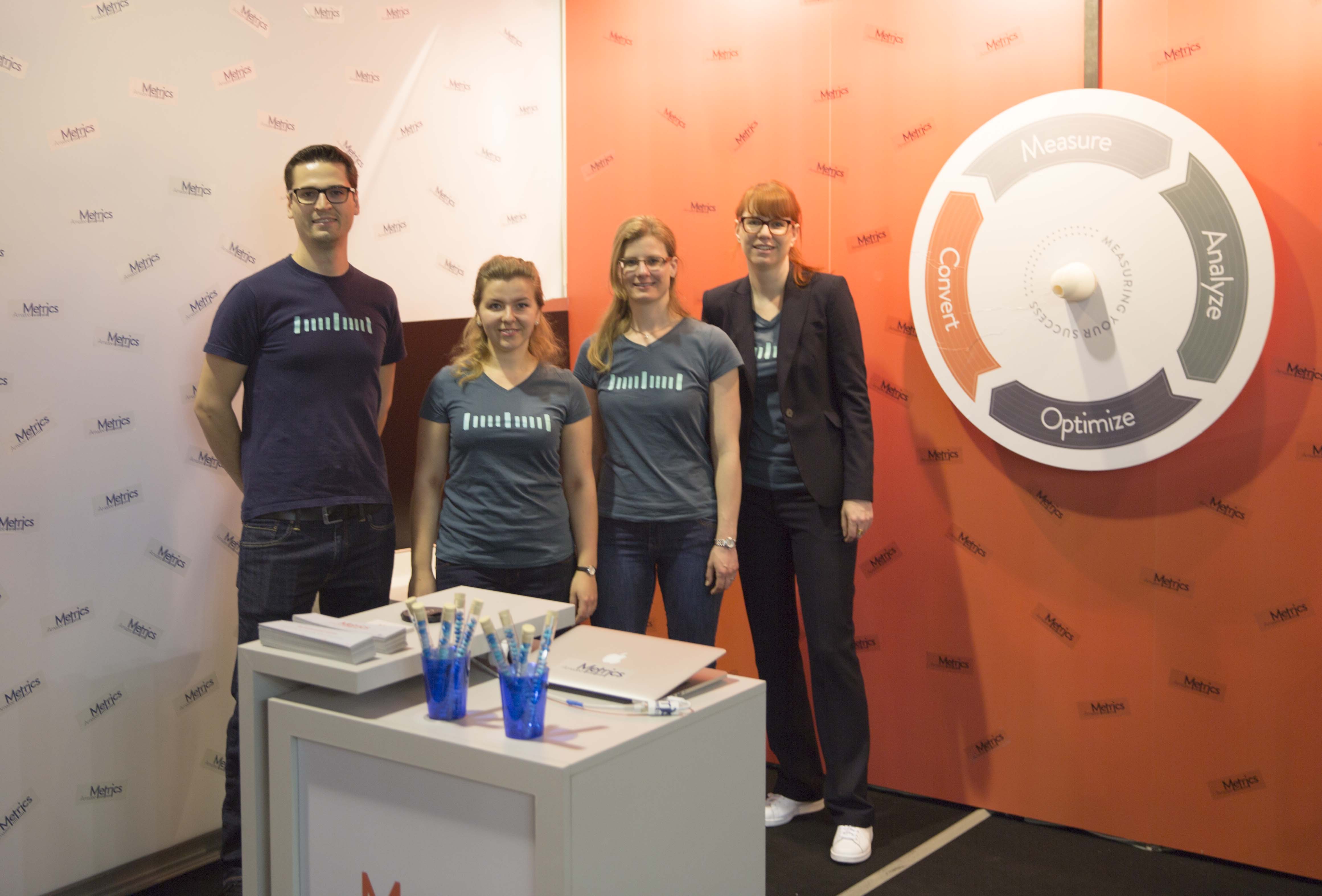 The Amazee Metrics team at our booth at SOM 2015